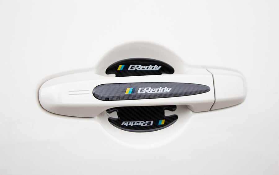 GREDDY DOOR HANDLE PROTECTOR CARBON TEXTURE 18003051