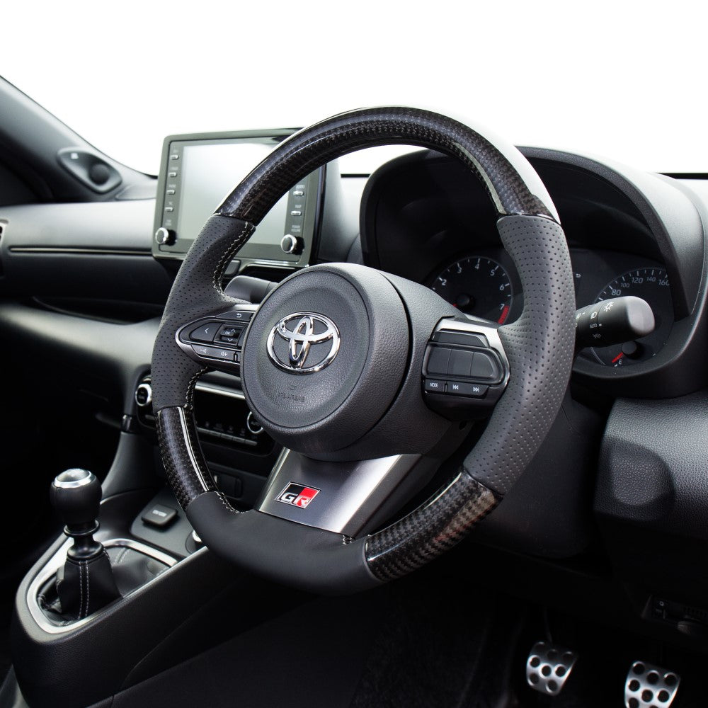 REAL ORIGINAL SERIES SOFT D SHAPE BLACK CARBON SILVER X BLACK EURO STITCH STEERING WHEEL FOR TOYOTA GR COROLLA GZEA14H  TYI-BKC-SL