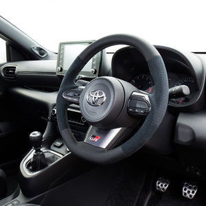 REAL ORIGINAL SERIES SOFT D SHAPE BLACK LEATHER & BLACK ULTRA SUEDE SILVER X BLACK EURO STITCH STEERING WHEEL FOR TOYOTA GR COROLLA GZEA14H  TYI-ALC-SL